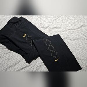 Nike Black Leggings with Gold Accents